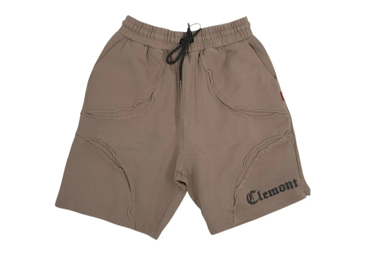 Vallmountbotique beige cotton blend athletic shorts with distressed seams and drawstring waist.