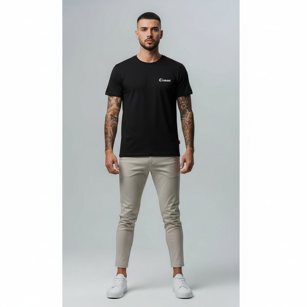 Vallmount Boutique black cotton t-shirt with 'Clemont' logo on chest and 'Crafted to Perfection' graphic on back. Model wears relaxed fit tee.