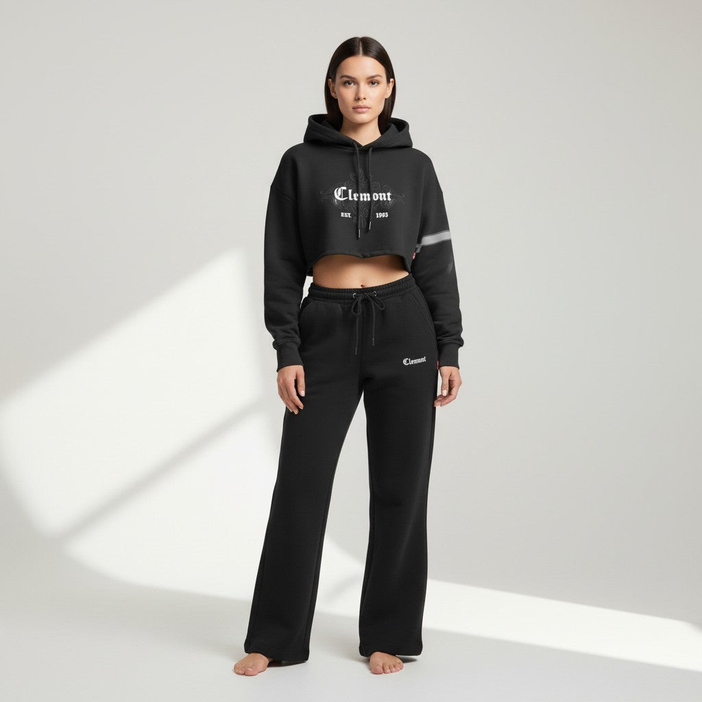 Vallmountbotique black cropped graphic hoodie with tie-dye sleeve detail and drawstring hood, worn by a model.