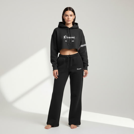 Vallmountbotique black cropped graphic hoodie with tie-dye sleeve detail and drawstring hood, worn by a model.