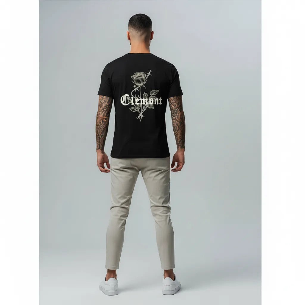 vallmountbotique black cotton t-shirt with graphic rose and barbed wire design on back.