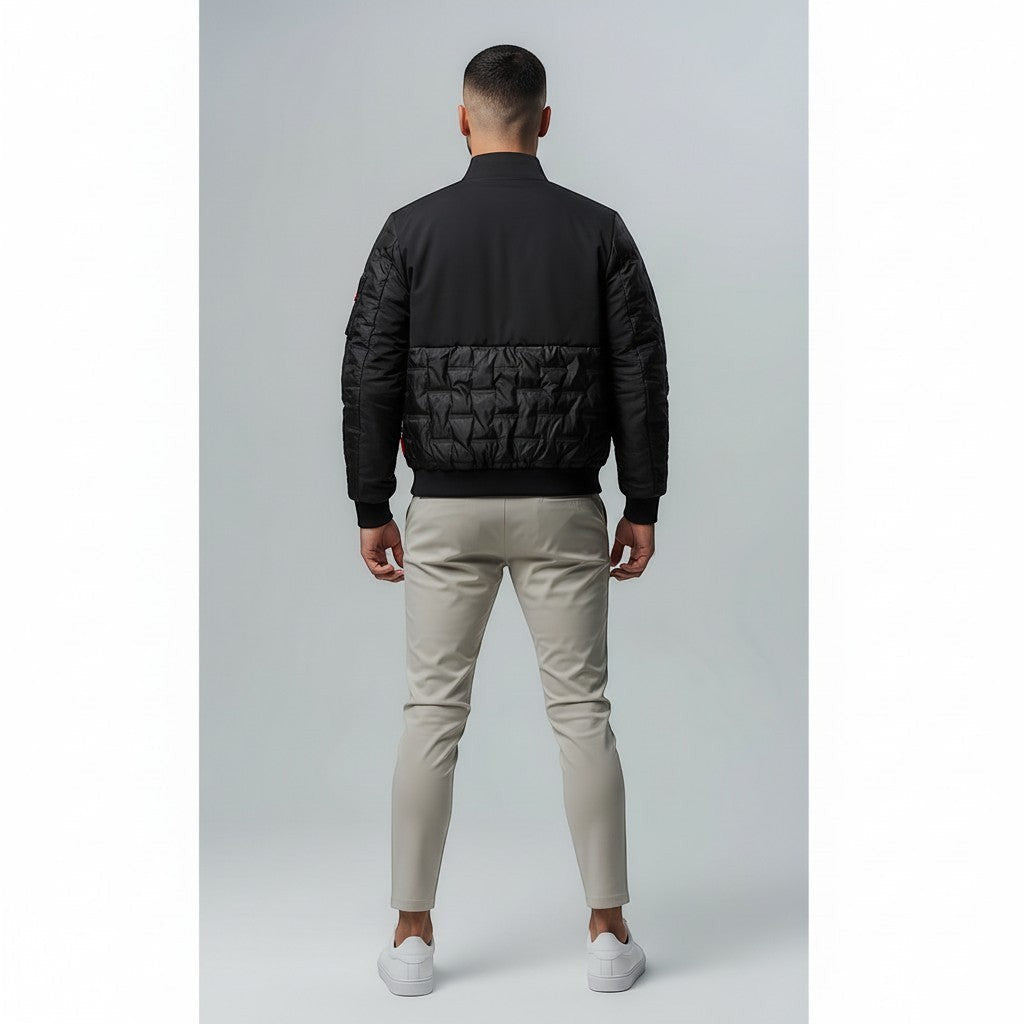 vallmountbotique black padded bomber jacket with quilted paneling, ribbed cuffs, collar, and hem.