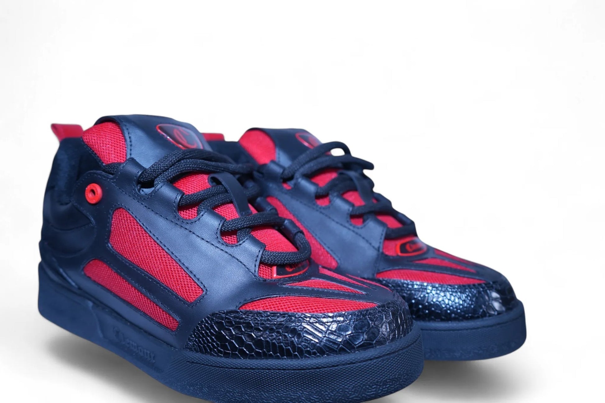 Vallmountbotique men's black and red fashion sneakers with breathable mesh panels and textured toe cap.