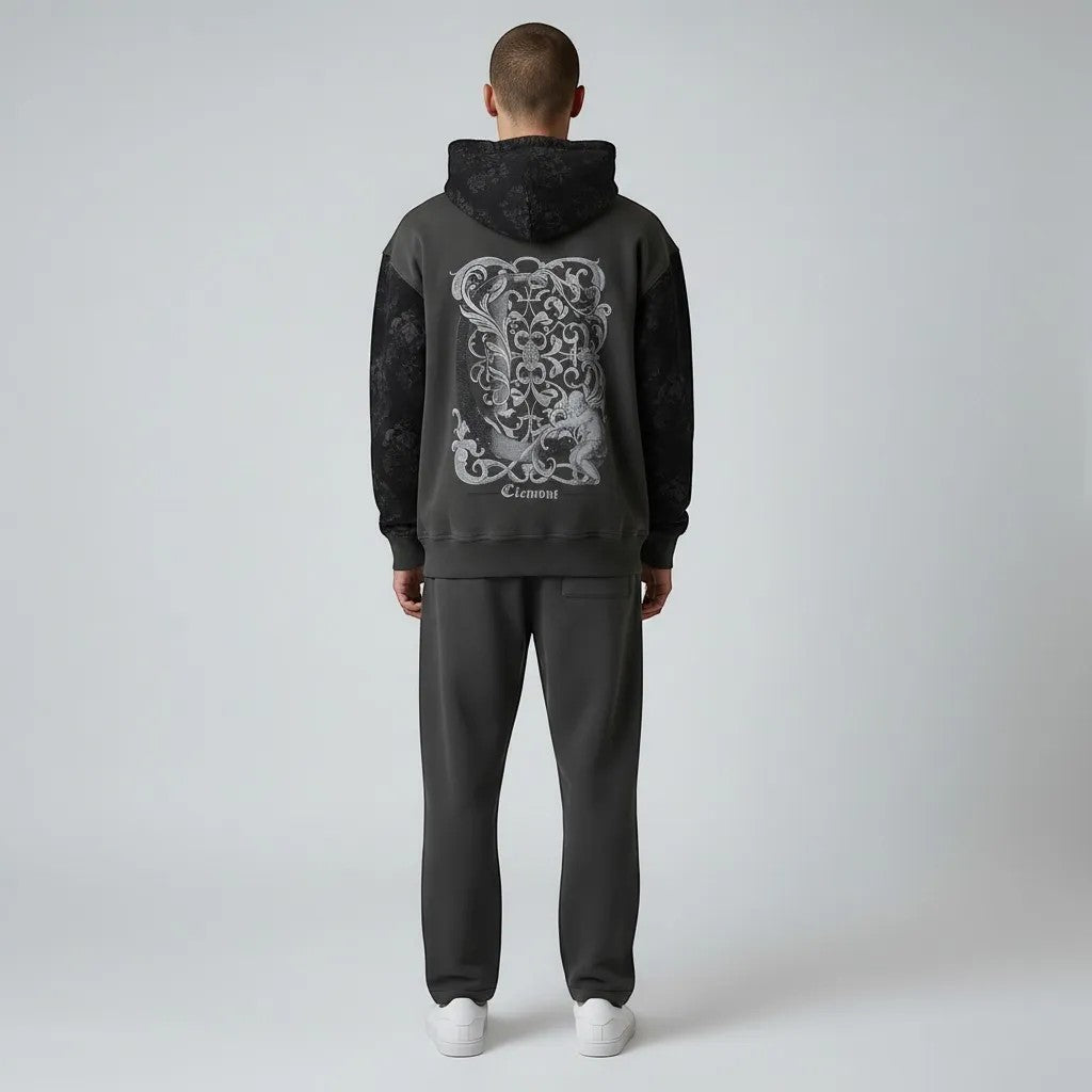 Vallmountbotique charcoal grey cotton blend hoodie with black floral sleeves and graphic chest detail.