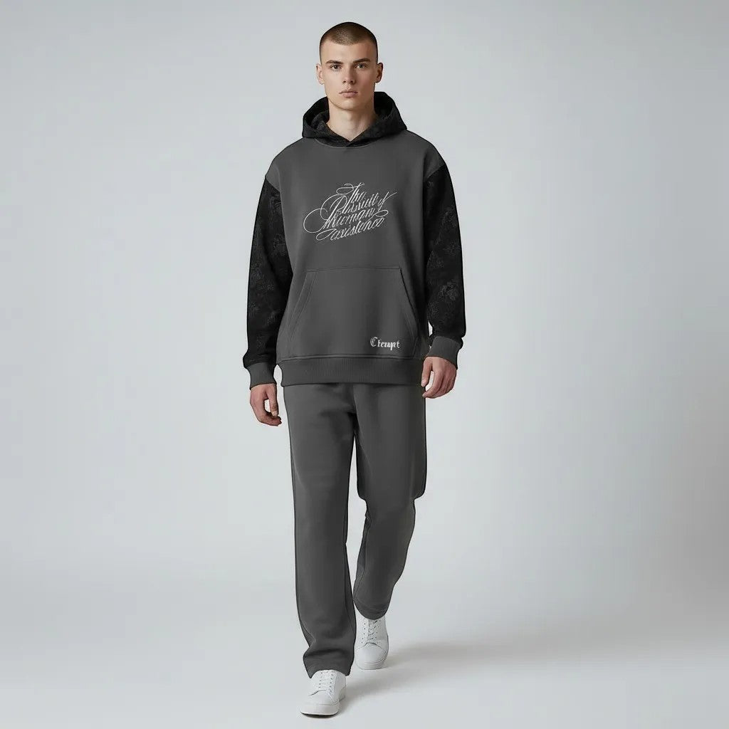 Vallmountbotique charcoal grey cotton blend hoodie with floral sleeves and white chest graphic. Features drawstring hood and kangaroo pocket.