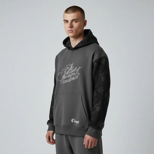 Vallmountbotique charcoal grey cotton blend hoodie with floral sleeves and white chest graphic. Features drawstring hood and kangaroo pocket.