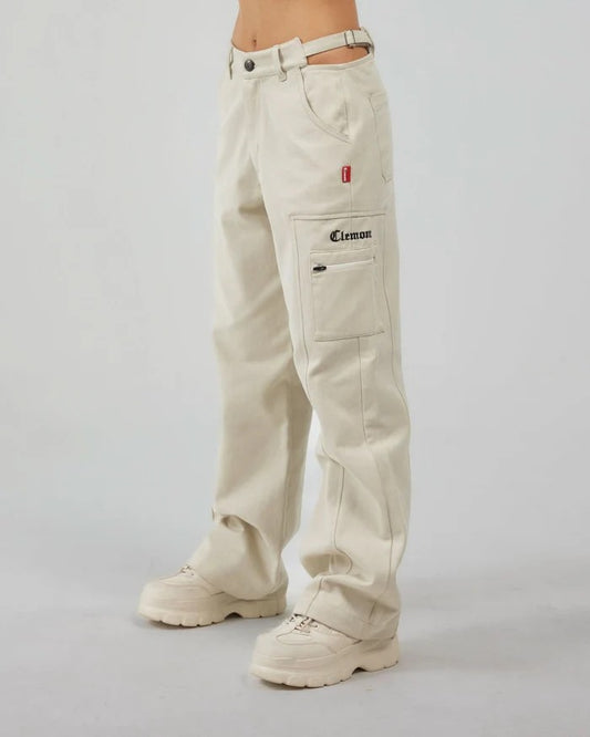 Vallmountbotique cream cotton blend wide-leg cargo pants with cutout waist detail and belt.