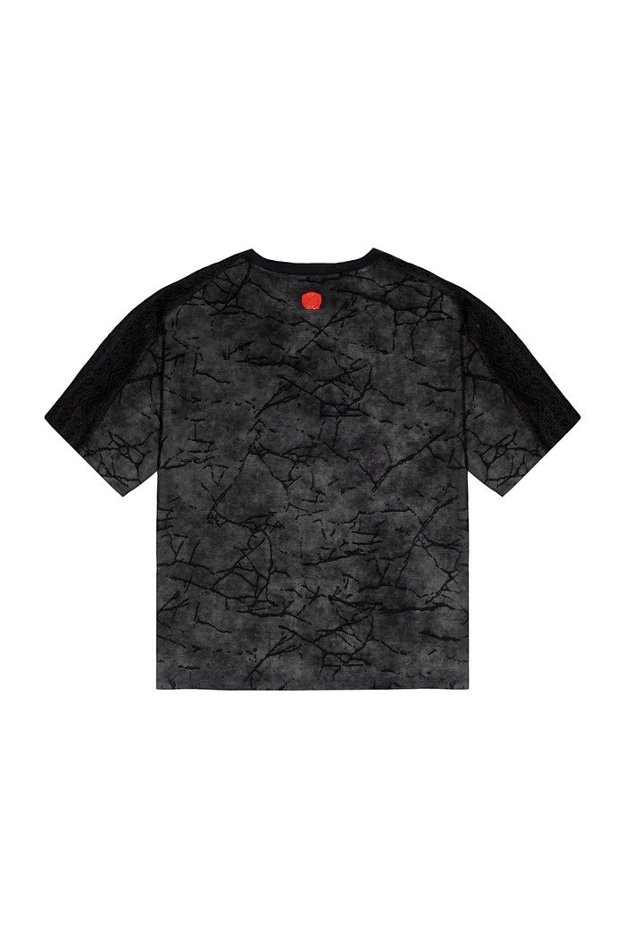 Vallmountbotique dark grey marble print crew neck t-shirt with short sleeves and a red logo detail on the back neck.