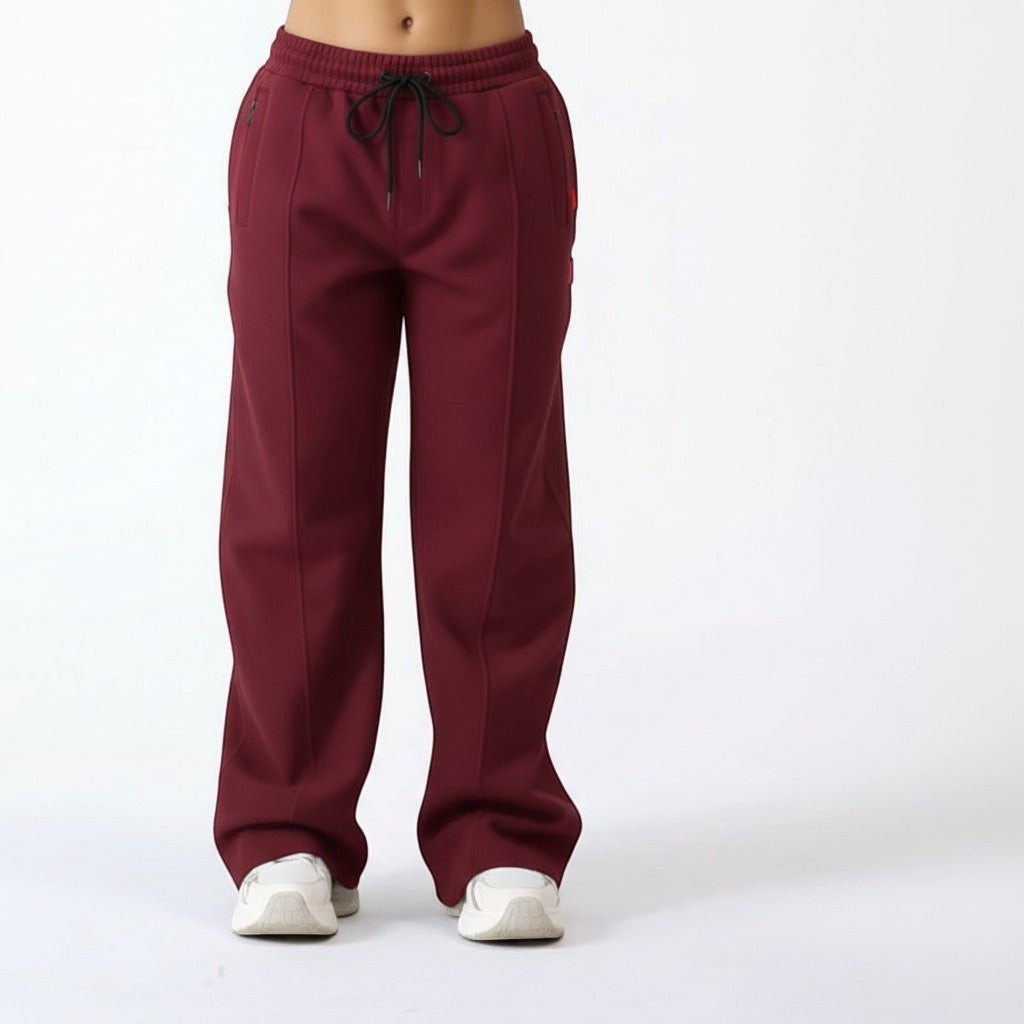 Vallmountbotique maroon wide leg track pants with drawstring waist and zippered ankles.