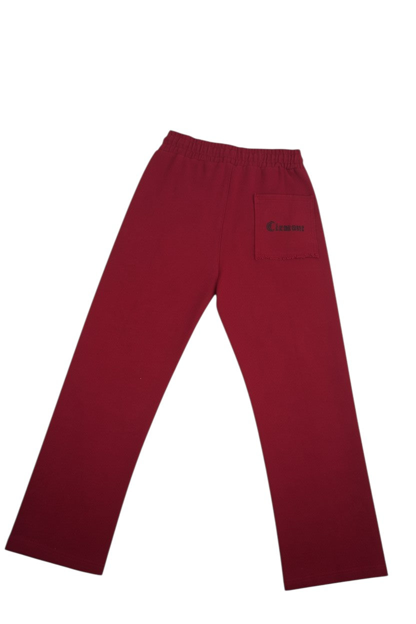 Vallmountbotique maroon wide leg track pants with drawstring waist, zippered ankles, and embroidered logo pocket.