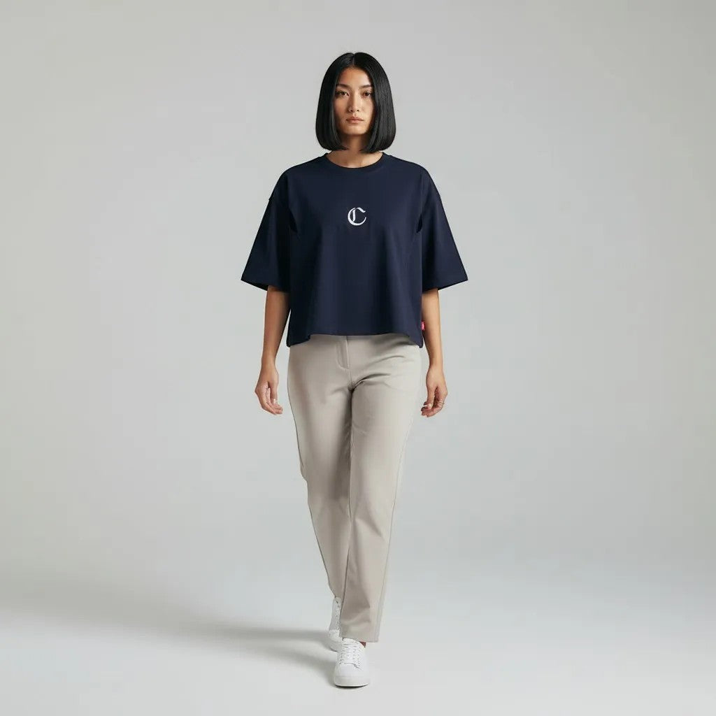 Vallmountbotique navy blue cropped cotton t-shirt with 'C' logo on chest and ornate graphic print on back.