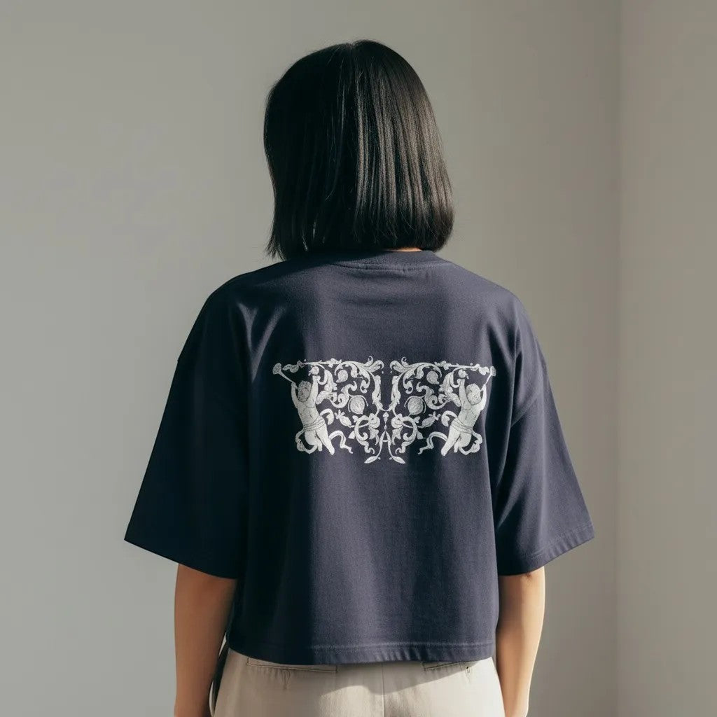 Vallmountbotique navy blue cotton cropped t-shirt with ornate graphic print on back.
