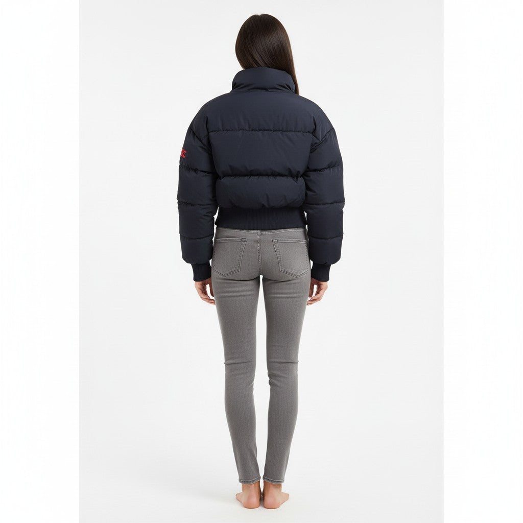 vallmountbotique navy blue puffer bomber jacket with high neck, quilted design, and ribbed cuffs and hem.