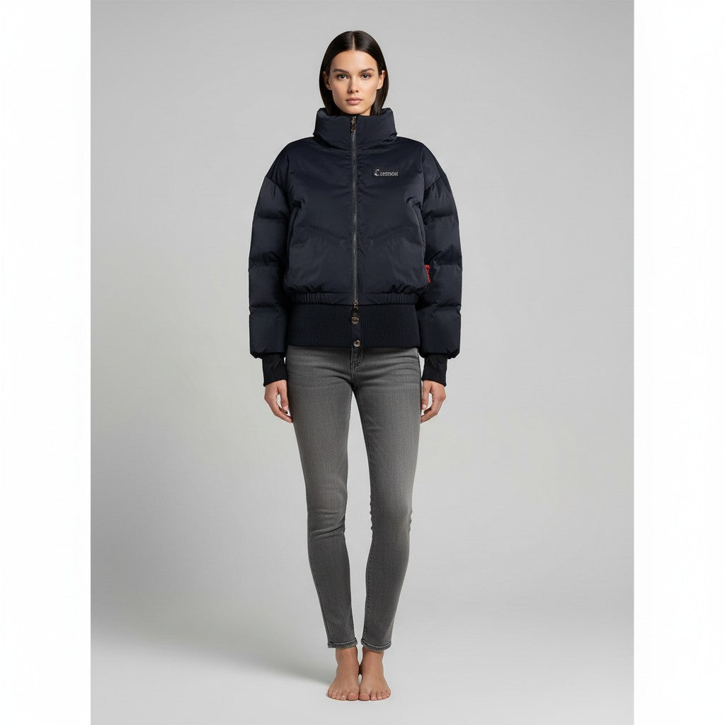 Vallmountbotique navy blue puffer bomber jacket with high neck, quilted design, ribbed cuffs and hem, and full zip closure.