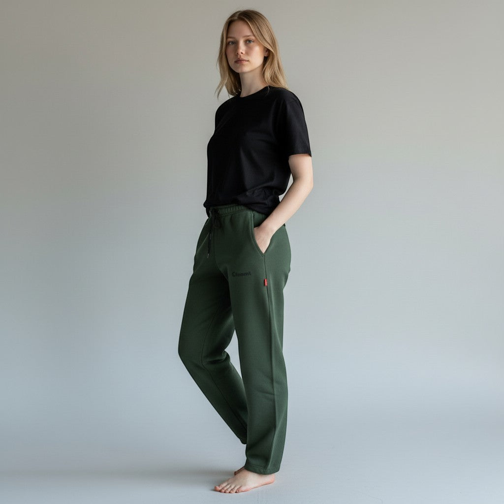 Vallmountbotique olive green relaxed fit sweatpants with drawstring waist and side pockets, worn by a model.