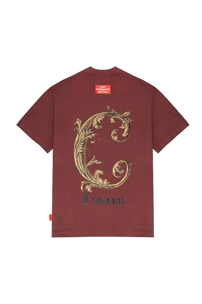 Vallmountbotique deep red cotton t-shirt with ornate gold 'C' graphic and 'Clemant' text on back. Relaxed fit.