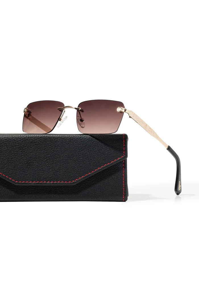 Vallmountbotique rimless square sunglasses with gradient brown lenses, gold-tone metal frame, and crystal embellished temples.