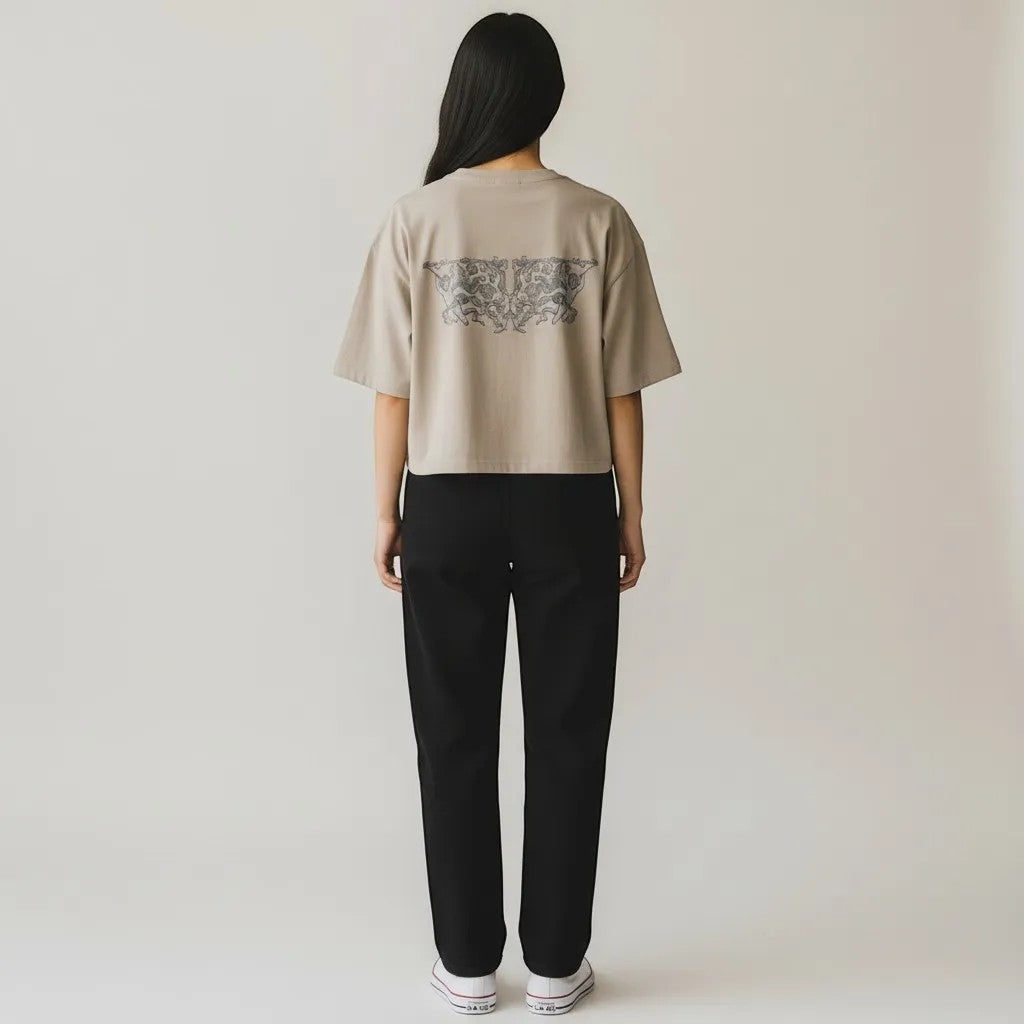 Vallmountbotique taupe cropped t-shirt with embroidered graphic on back, relaxed fit, short sleeves.
