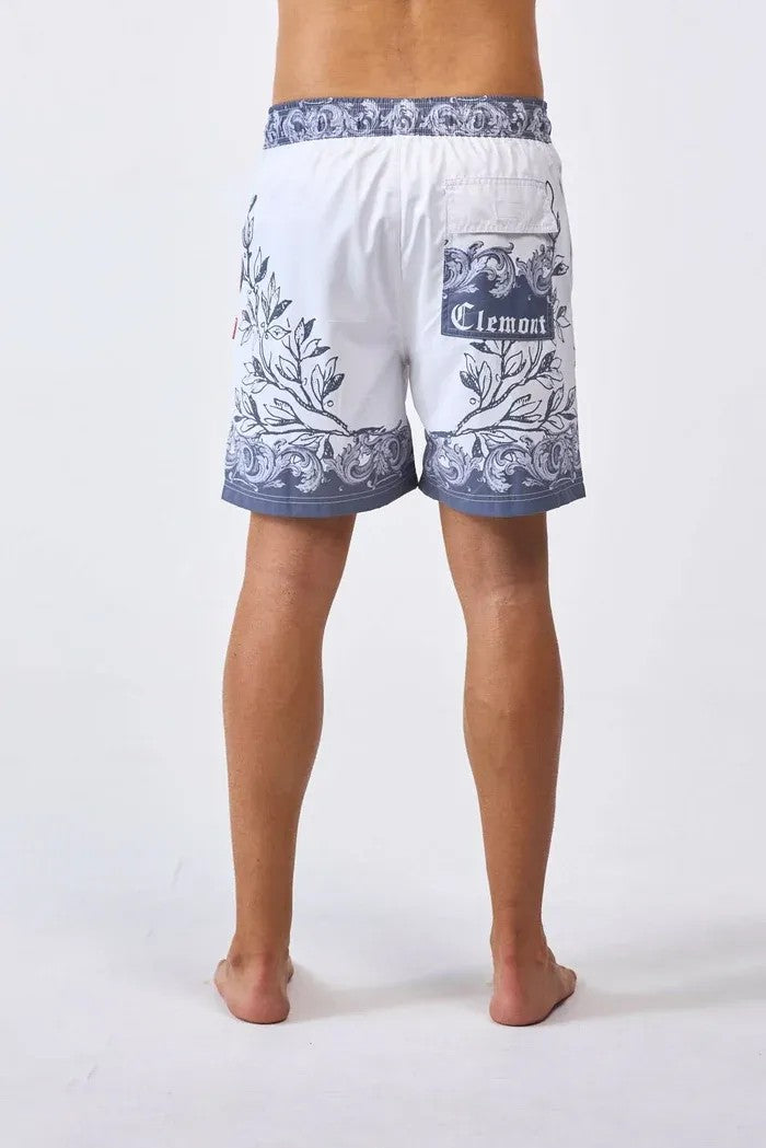 Vallmountbotique white swim shorts with baroque cherub print and adjustable drawstring.